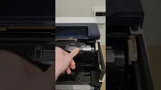 swapping out toner in a Xerox b400 