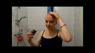 young girl self head shave in bathroom
