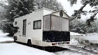 SNOW CAMPING WITH A CARAVAN ON A FROZEN LAKE