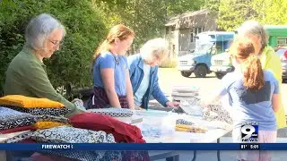 Dozens help at Eugene church to send school supplies to refugee children