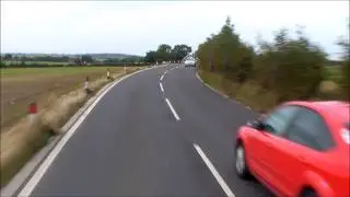 Two idiots overtaking a 18 Tonne truck and almost having a head on crash