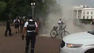 WASHINGTON (AP) — 2 arrested after flag burning near White House