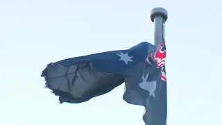 Labor under fire from Coalition for damaged Australian flag