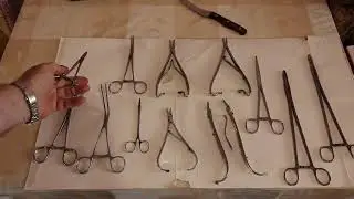 Иглодержатели и зажимы для рыболовных крючков.