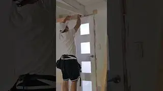 Maxkil putting trim around doorway