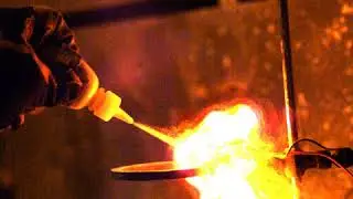 Spark igniting lycopodium powder spray recorded at high speed
