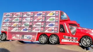 Let's put a minicar in a large red truck & 22 boxes