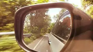 Free Stock Footage - 4K, Reflection in the car mirror while driving on a country highway, With 3LUT