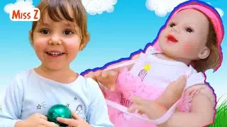 Амелька играет с куклой РЕБОРН Настя  Подарок на день рождения
