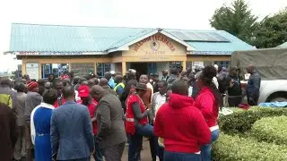 Parents gather outside Kenya primary school after fire kills 17 children | AFP