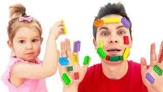 Avery and dad play with lego and sweets