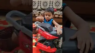 Rohit repairing his bike