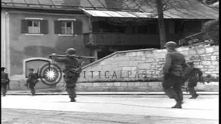 Soldiers of 101st Airborne Division 506th PIR 3rd BN walk on streets in Germany d...HD Stock Footage