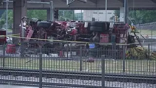 Dallas fire truck falls off interstate and crashes into rail lines below