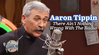 Aaron Tippin sings "There Ain't Nothing Wrong With the Radio"