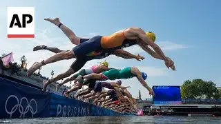 AP photographer explains what its like capturing triathlon swimming