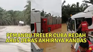 CUBAAN MERENTAS BANJlR DI JALAN KEMAYAN - TEMBANGAU , 2 PEMANDU TRELER DISELAMATKAN