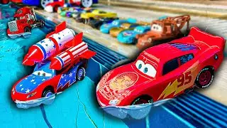 Disney Pixar Cars falling into deep pool, Lightning McQueen, Tow Mater, Mack, Sally, Francesco