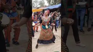 African beauty dancing to the melody at the fair