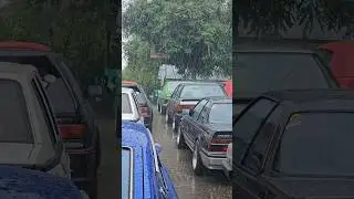 Classic cars during the rain.