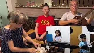 Feliz Navidad with 伯公 (Grand Uncle)