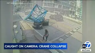 Woman walks away without a scratch after part of a crane falls on top of her car