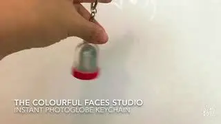 Unique Customized Instant Photo globe Keychain at a Photo booth