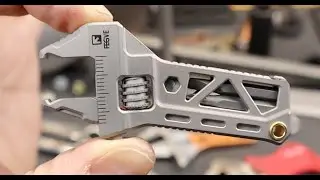 Titanium Joy! FEGVE Ti EDC wrench with bit driver, bottle opener, and pliers(?).