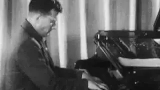Shostakovich plays a fragment of his 7th symphony (1941)
