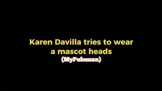 Karen Davilla tries to wear a mascot heads!