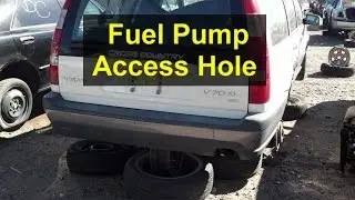 Fuel pump access hole in floor of a P80 Volvo with AWD system. V70 R, V70 AWD, V70 Cross County.