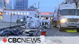 Tents torn down as workers, police remove Edmonton encampment