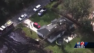 Tree falls on house