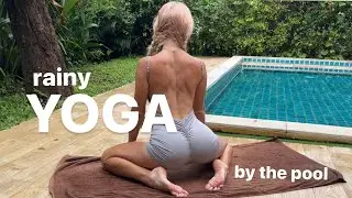 Rainy yoga by the pool