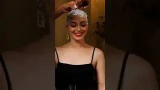 gorgeous women enjoying head shave in salon