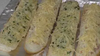 Garlic baguette with cheese in the oven!JUST DELICIOUS! A crunchy snack!